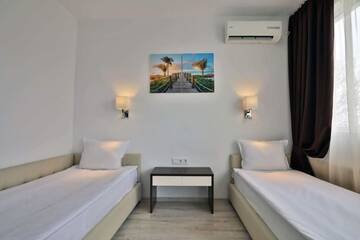 Фото номера Two-Bedroom Deluxe Suite with Balcony Отель Prestige Deluxe Hotel Aquapark Club- All inclusive г. Золотые Пески 21
