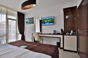 Фото номера Two-Bedroom Deluxe Suite with Balcony Отель Prestige Deluxe Hotel Aquapark Club- All inclusive г. Золотые Пески 15