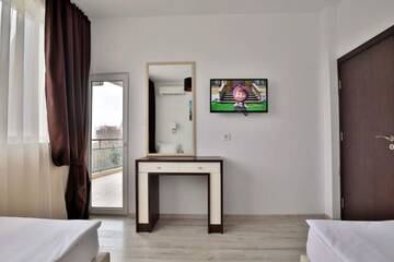 Фото номера Two-Bedroom Deluxe Suite with Balcony Отель Prestige Deluxe Hotel Aquapark Club- All inclusive г. Золотые Пески 23