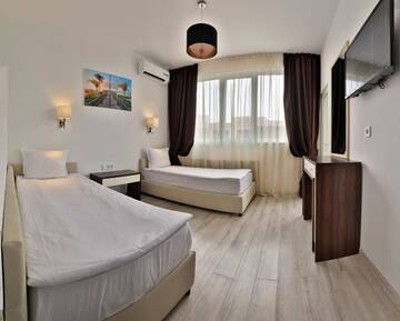 Фото номера Two-Bedroom Deluxe Suite with Balcony Отель Prestige Deluxe Hotel Aquapark Club- All inclusive г. Золотые Пески 11