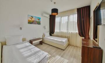 Фото номера Two-Bedroom Deluxe Suite with Balcony Отель Prestige Deluxe Hotel Aquapark Club- All inclusive г. Золотые Пески 8