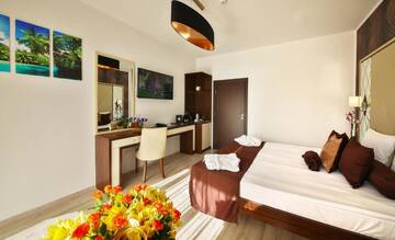 Фото номера Two-Bedroom Deluxe Suite with Balcony Отель Prestige Deluxe Hotel Aquapark Club- All inclusive г. Золотые Пески 6